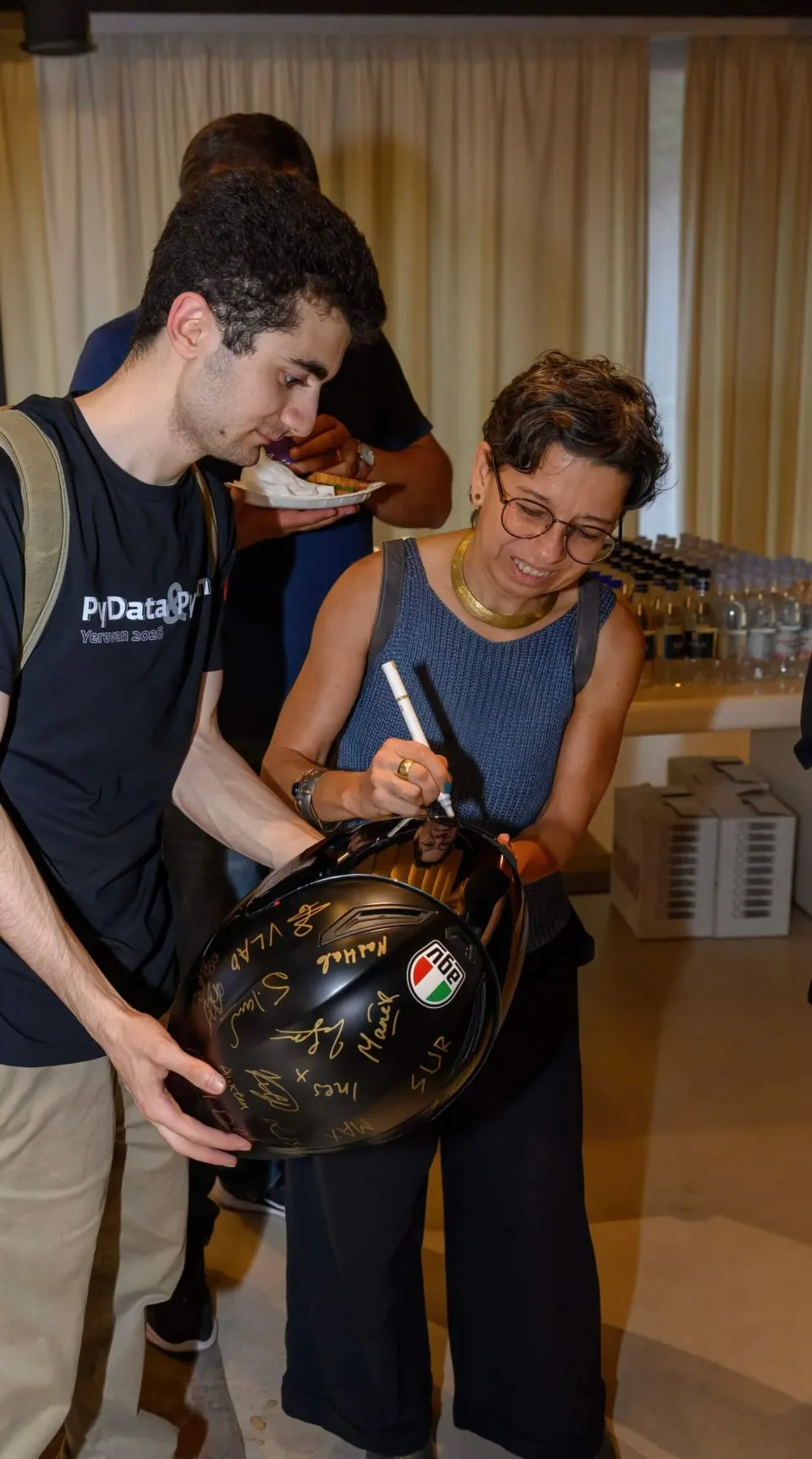 Close-up of signatures on the helmet