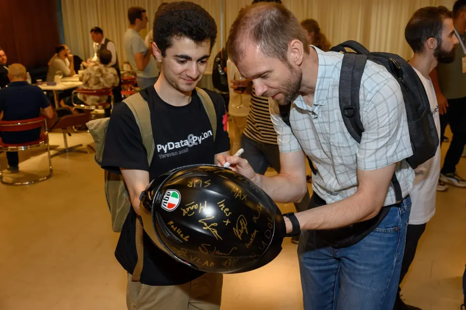 Close-up of signatures on the helmet